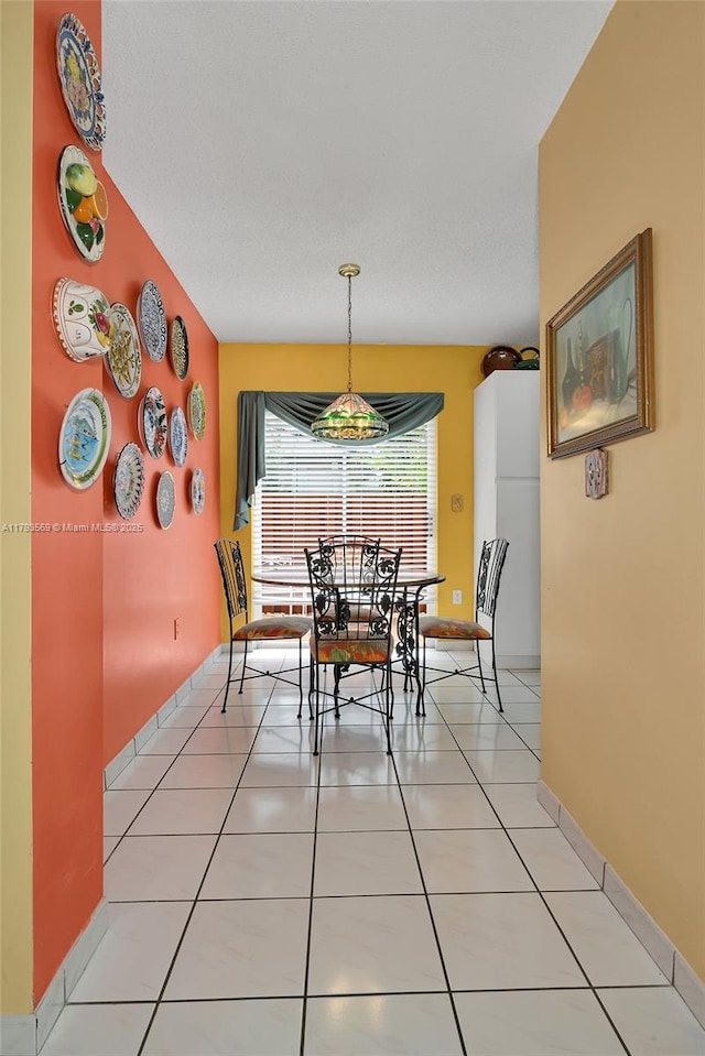 13230 NW 10th St, Miami, FL 33182 - dining area featuring baseboards and light tile patterned flooring