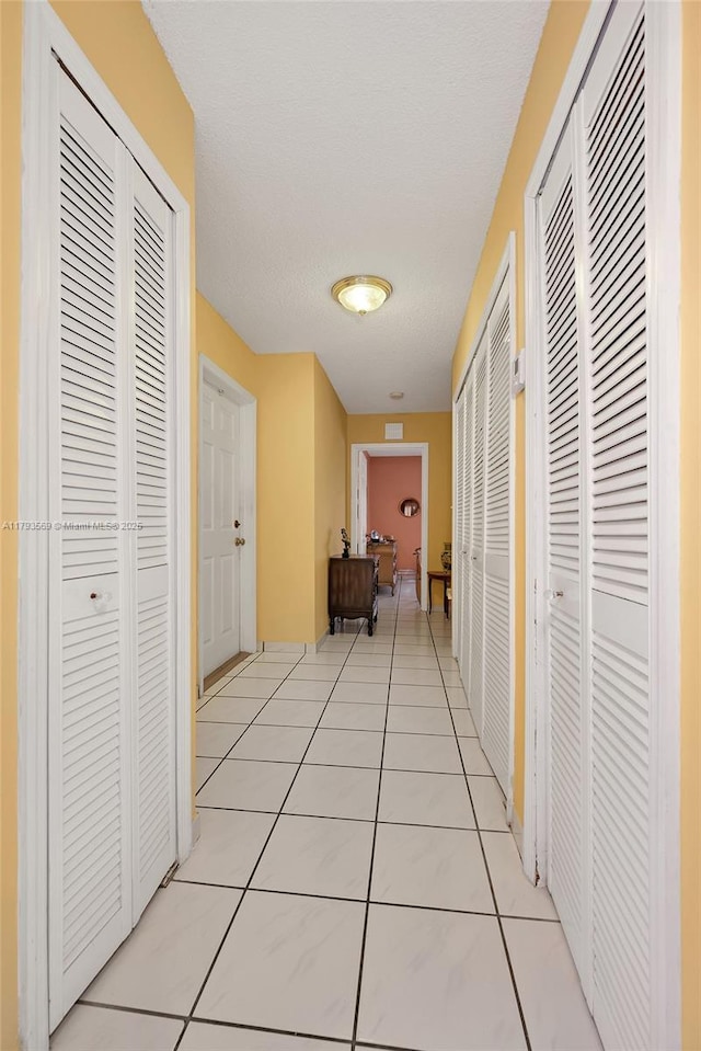 13230 NW 10th St, Miami, FL 33182 - hallway with light tile patterned flooring