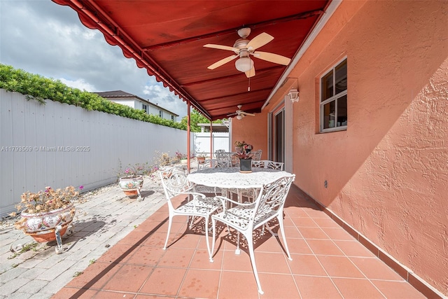 13230 NW 10th St, Miami, FL 33182 - view of patio / terrace featuring outdoor dining area, a fenced backyard, and ceiling fan