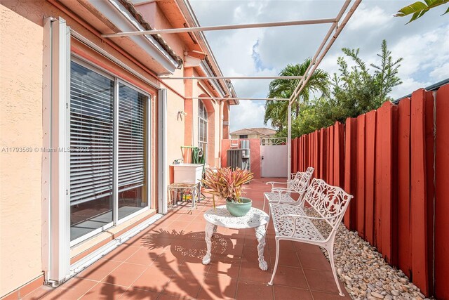 13230 NW 10th St, Miami, FL 33182 - view of patio / terrace featuring fence private yard