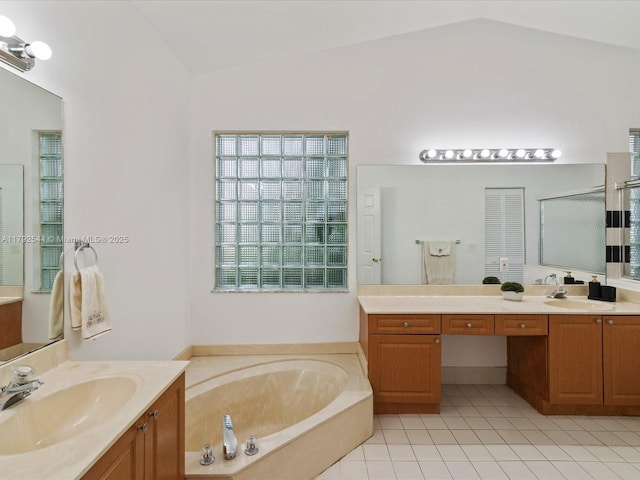 1230 SW 102nd Ave, Pembroke Pines, FL 33025 - bathroom with tile patterned flooring, a sink, lofted ceiling, and a garden tub