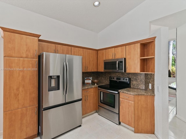 1230 SW 102nd Ave, Pembroke Pines, FL 33025 - kitchen with light tile patterned flooring, open shelves, stainless steel appliances, lofted ceiling, and backsplash