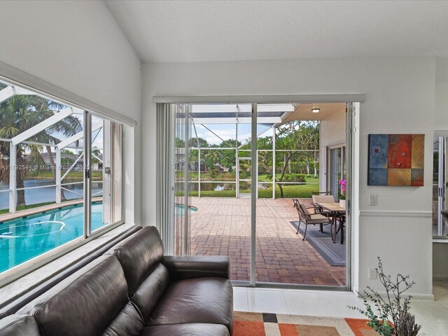 1230 SW 102nd Ave, Pembroke Pines, FL 33025 - living room with a water view and a sunroom