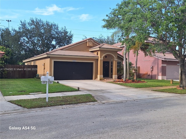 20401 SW 1st St, Pembroke Pines, FL 33029 - mediterranean / spanish-style house with fence, stucco siding, a garage, and a front yard