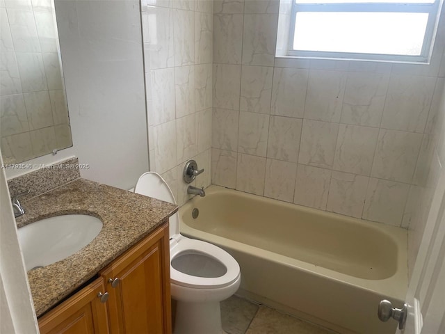 bathroom with toilet,  shower combination, tile patterned flooring, and vanity
