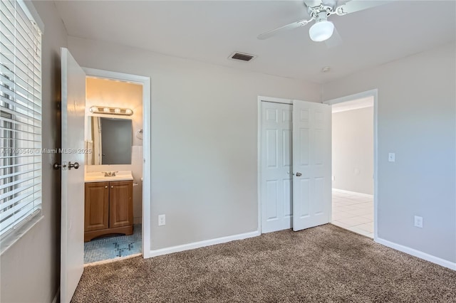 6437 Custer St, Hollywood, FL 33024 - unfurnished bedroom with multiple windows, visible vents, a closet, carpet, and ensuite bath