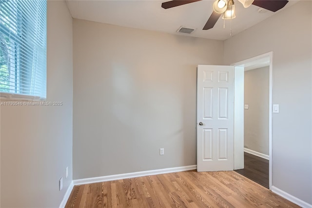 6437 Custer St, Hollywood, FL 33024 - spare room with baseboards, ceiling fan, wood finished floors, and visible vents