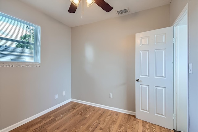 6437 Custer St, Hollywood, FL 33024 - empty room featuring baseboards, ceiling fan, visible vents, and light wood-style flooring