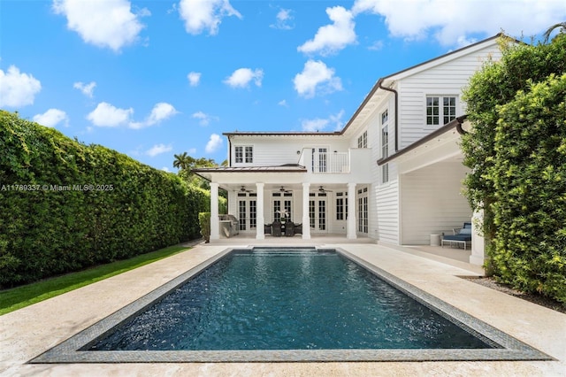 730 Santurce Ave, Coral Gables, FL 33143 - rear view of property with a patio, a ceiling fan, french doors, and a fenced in pool