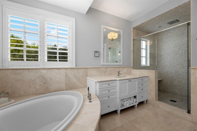 730 Santurce Ave, Coral Gables, FL 33143 - full bath with a bath, visible vents, a shower stall, vanity, and tile patterned floors