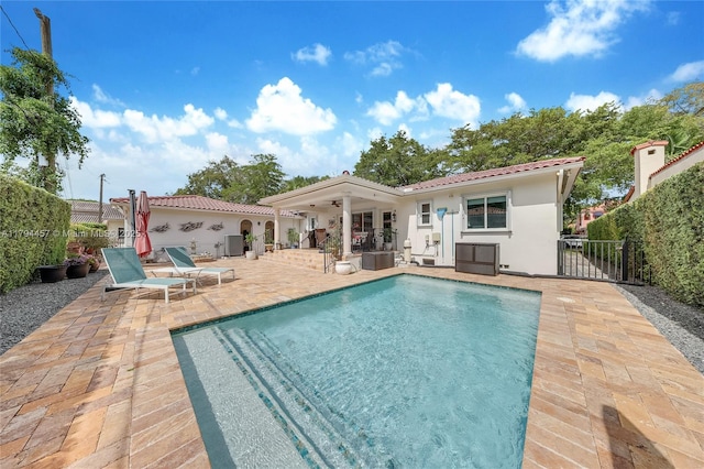 1402 Tangier St, Coral Gables, FL 33134 - view of pool featuring a patio area and a ceiling fan