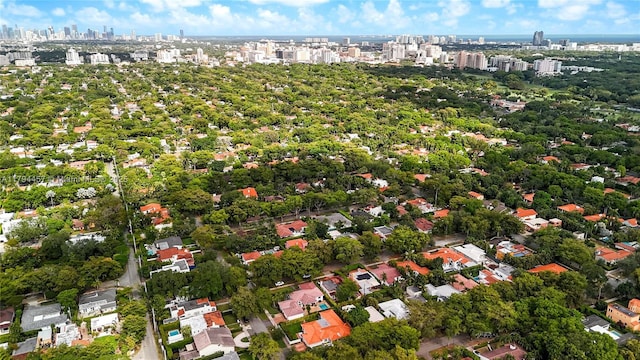 birds eye view of property with a view of city