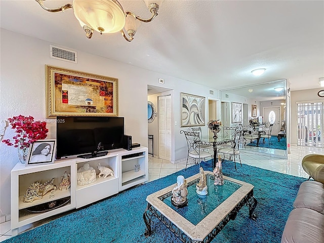 tiled living area with visible vents