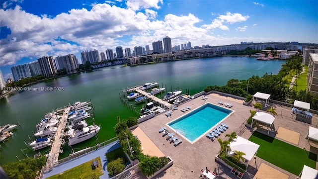 aerial view featuring a water view and a city view