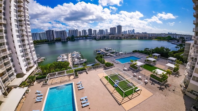 bird's eye view with a water view and a city view