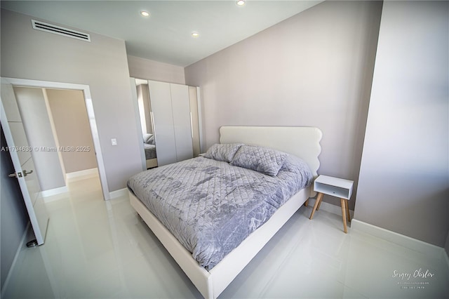 bedroom with visible vents, recessed lighting, baseboards, and light tile patterned floors