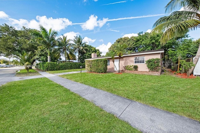 2821 N 74th Ave, Hollywood, FL 33024 - view of front facade with a front lawn and stucco siding
