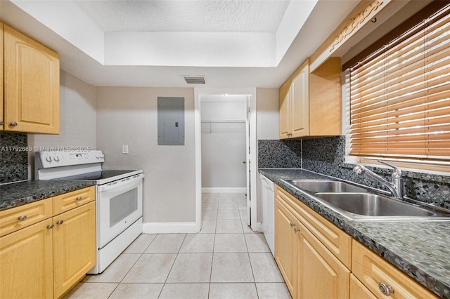 2821 N 74th Ave, Hollywood, FL 33024 - kitchen with white appliances, a sink, electric panel, light tile patterned flooring, and decorative backsplash