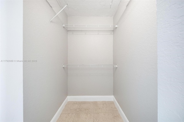 2821 N 74th Ave, Hollywood, FL 33024 - walk in closet with tile patterned flooring