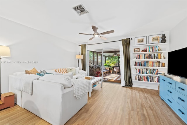 450 SE 7th St Unit 234, Dania Beach, FL 33004 - living area with ceiling fan, light wood finished floors, and visible vents