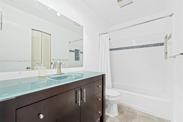 450 SE 7th St Unit 234, Dania Beach, FL 33004 - bathroom featuring toilet, tile patterned floors, shower / bath combination with curtain, and vanity