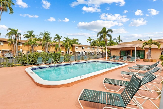 450 SE 7th St Unit 234, Dania Beach, FL 33004 - pool featuring fence and a patio area
