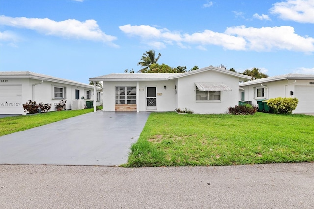 5810 NW 82nd Ter, Tamarac, FL 33321 - single story home with driveway, stucco siding, and a front yard