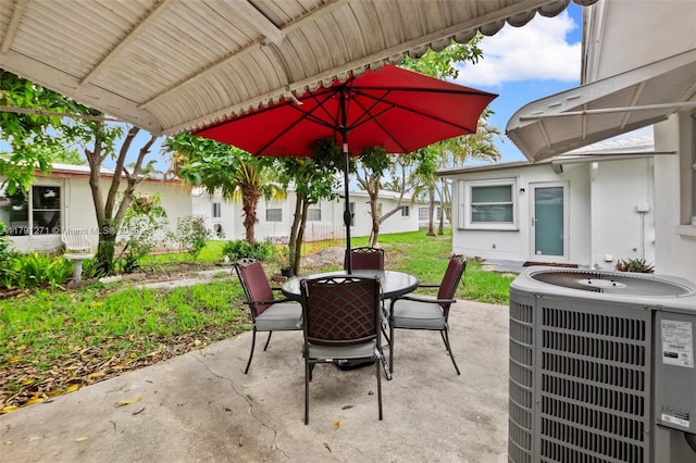 5810 NW 82nd Ter, Tamarac, FL 33321 - view of patio / terrace featuring central air condition unit and outdoor dining area