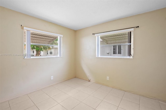 5810 NW 82nd Ter, Tamarac, FL 33321 - empty room featuring baseboards