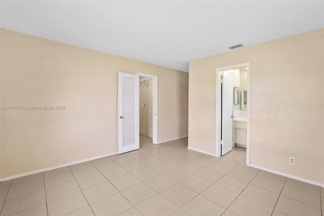 5810 NW 82nd Ter, Tamarac, FL 33321 - unfurnished room featuring baseboards and light tile patterned floors