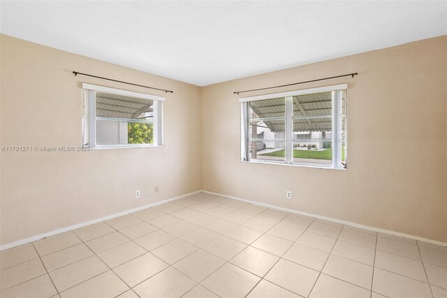 5810 NW 82nd Ter, Tamarac, FL 33321 - unfurnished room with baseboards