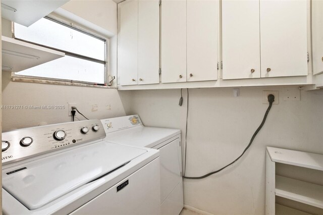 5810 NW 82nd Ter, Tamarac, FL 33321 - washroom with washing machine and clothes dryer and cabinet space