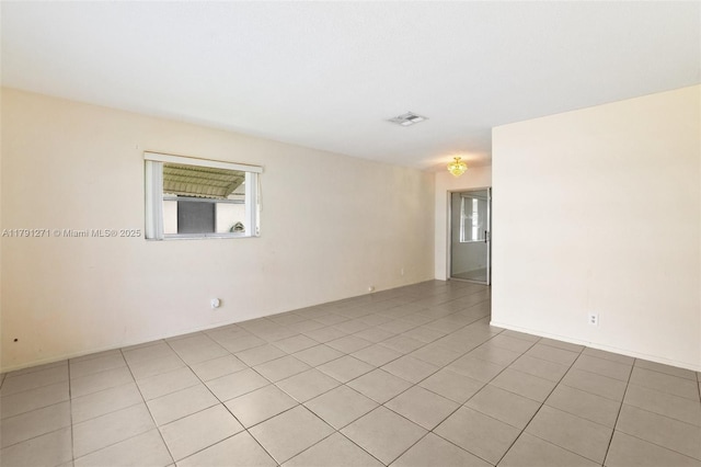 5810 NW 82nd Ter, Tamarac, FL 33321 - empty room featuring light tile patterned floors