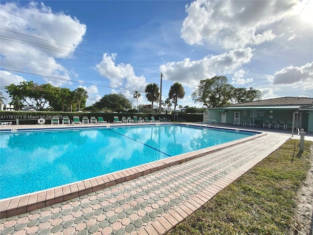 5810 NW 82nd Ter, Tamarac, FL 33321 - community pool featuring a patio area