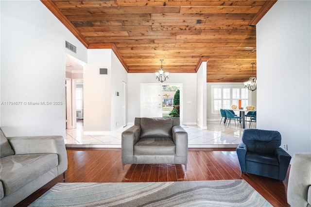 7354 NW 49th Ct, Lauderhill, FL 33319 - living room with an inviting chandelier, wood ceiling, crown molding, and visible vents