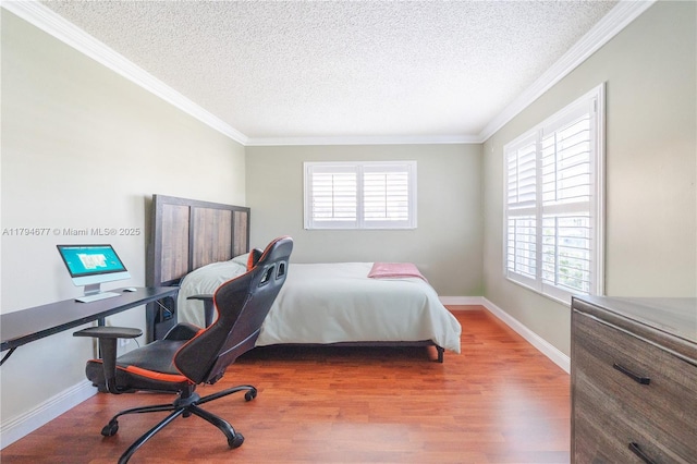 7354 NW 49th Ct, Lauderhill, FL 33319 - bedroom with a textured ceiling, multiple windows, and wood finished floors