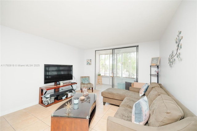living room with light tile patterned floors