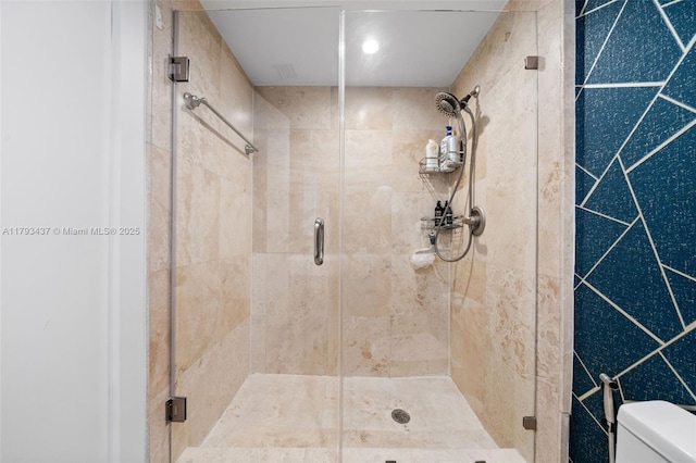 701 Brickell Key Blvd Unit 1812, Miami, FL 33131 - bathroom featuring a shower stall and toilet