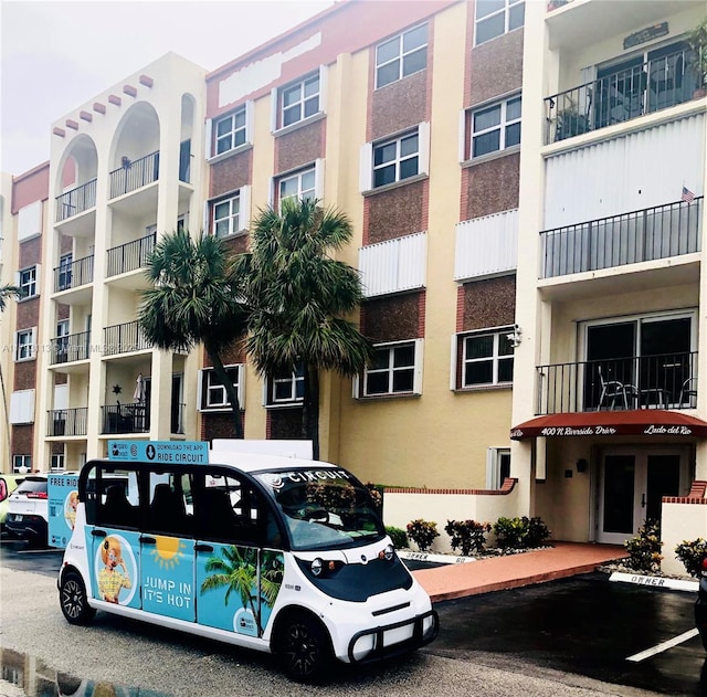 400 N Riverside Dr Unit 512, Pompano Beach, FL 33062 - view of apartment building / complex with uncovered parking