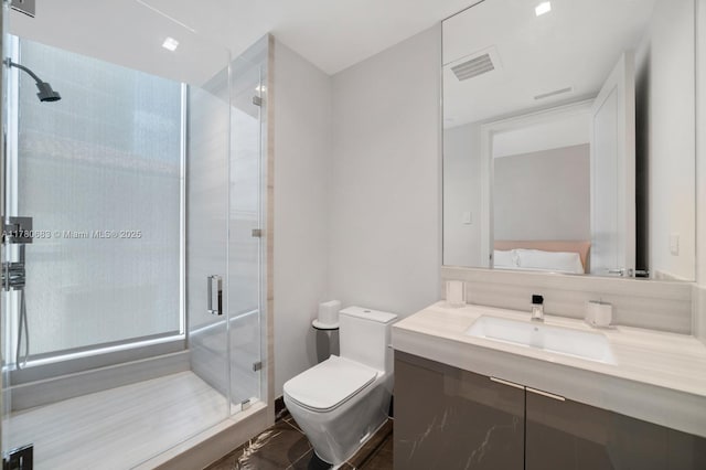 full bathroom featuring vanity, a shower stall, toilet, and visible vents