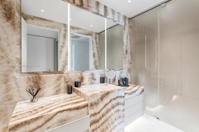 bathroom with vanity and backsplash