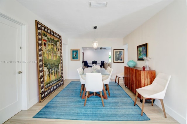 10861 SW 126th St, Miami, FL 33176 - dining room featuring baseboards, visible vents, and light wood-type flooring