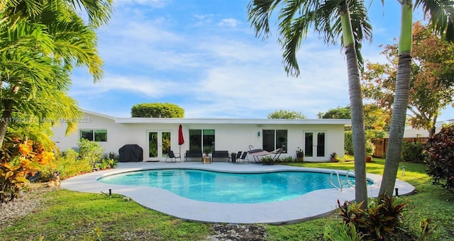 10861 SW 126th St, Miami, FL 33176 - view of pool with fence, a patio, french doors, a fenced in pool, and a yard