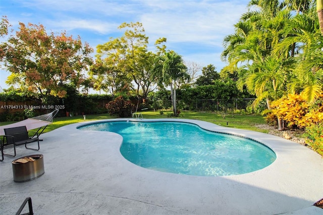 10861 SW 126th St, Miami, FL 33176 - view of swimming pool featuring a fenced backyard, a fenced in pool, a lawn, and a patio area