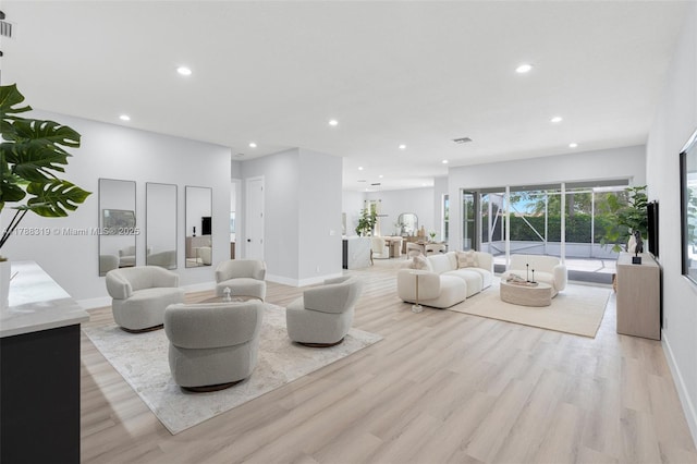 4629 Mariners Cove Dr, Wellington, FL 33449 - living area with light wood-style floors and recessed lighting