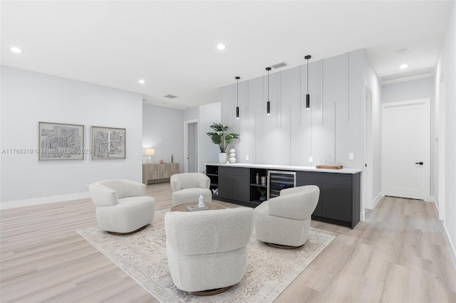 4629 Mariners Cove Dr, Wellington, FL 33449 - living room featuring wine cooler, light wood-type flooring, bar area, and recessed lighting