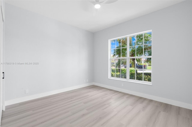 4629 Mariners Cove Dr, Wellington, FL 33449 - spare room featuring ceiling fan and light wood-type flooring