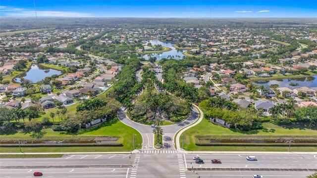 4629 Mariners Cove Dr, Wellington, FL 33449 - aerial overview of property's location featuring a nearby body of water and nearby suburban area