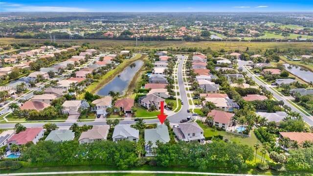 4629 Mariners Cove Dr, Wellington, FL 33449 - aerial overview of property's location featuring nearby suburban area and a nearby body of water