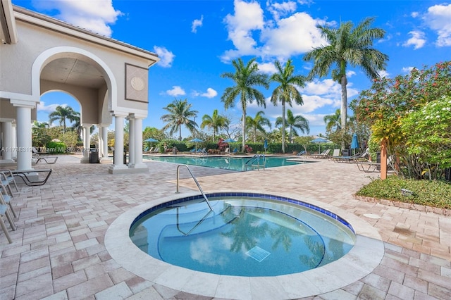 4629 Mariners Cove Dr, Wellington, FL 33449 - community pool with a hot tub and a patio